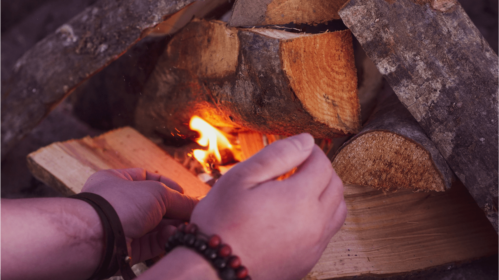 A campfire being started